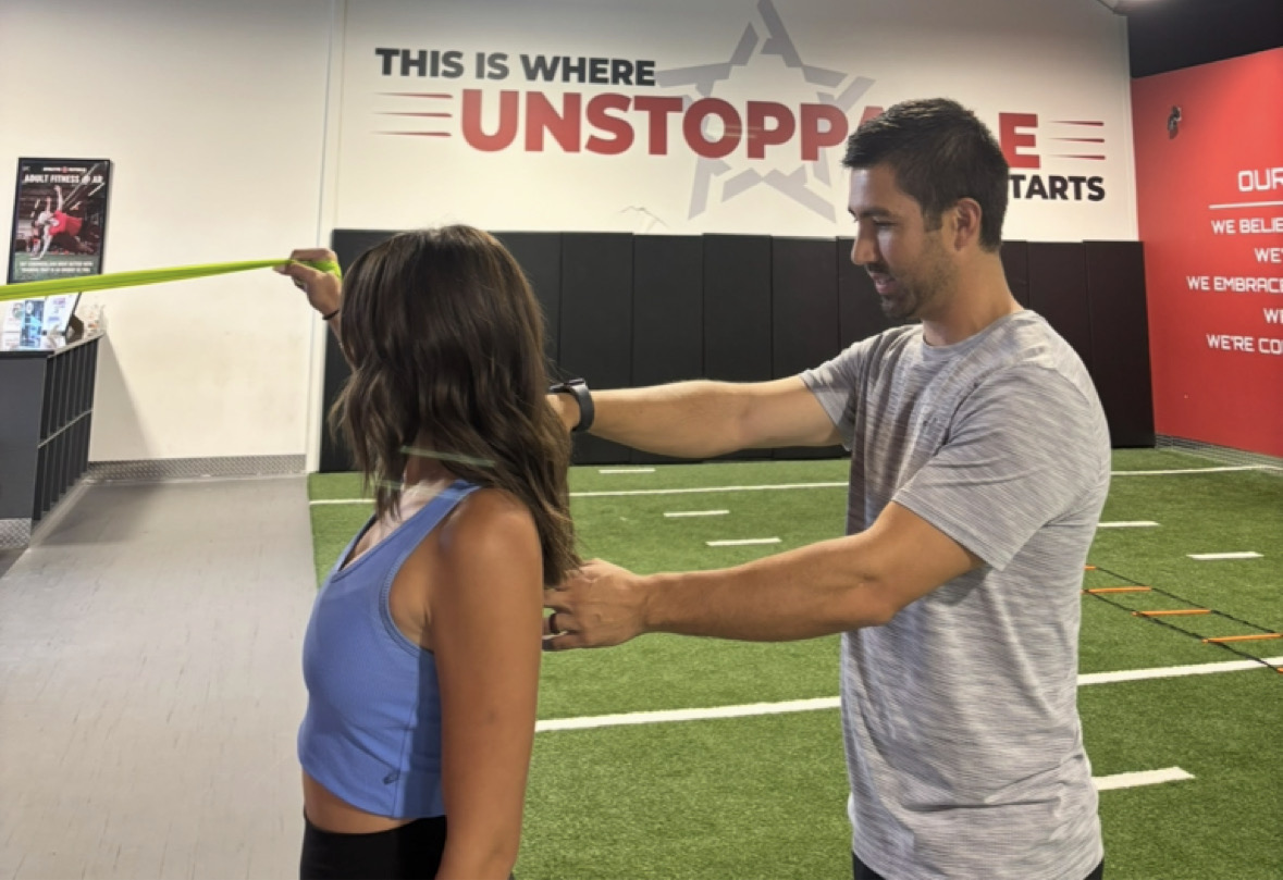 Physical therapist performing a comprehensive patient evaluation